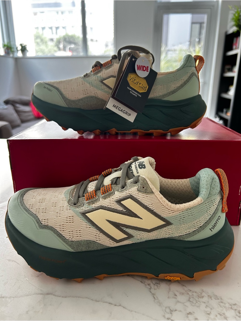 New Balance Women’s Mint, Dark Green & Orange Trail Sneakers